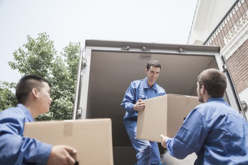Furniture and boxes being transported by a removals van in Eltham