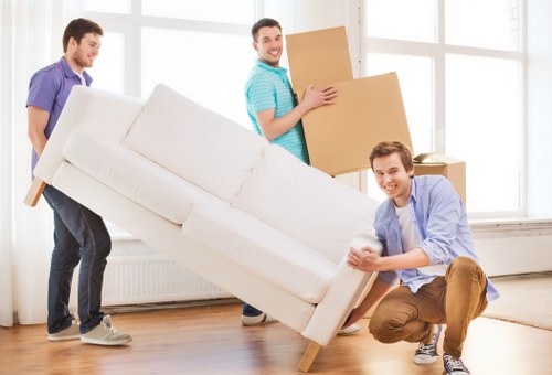 Packed moving boxes and furniture prepared for transport