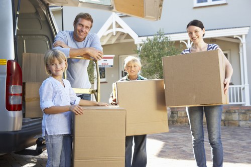Loading furniture and boxes into a removal van in Eltham