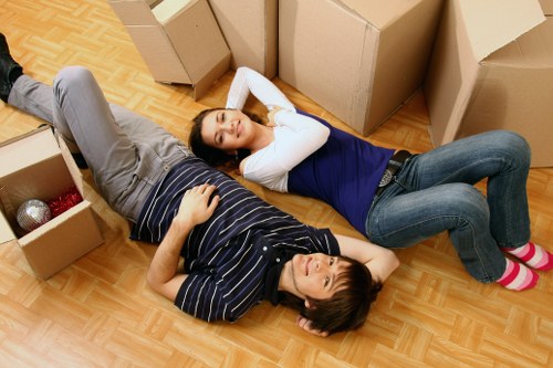 Organised packing materials and labelled moving boxes