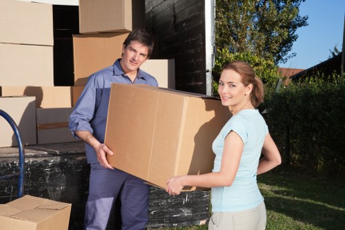 Local moving van loading furniture in Eltham